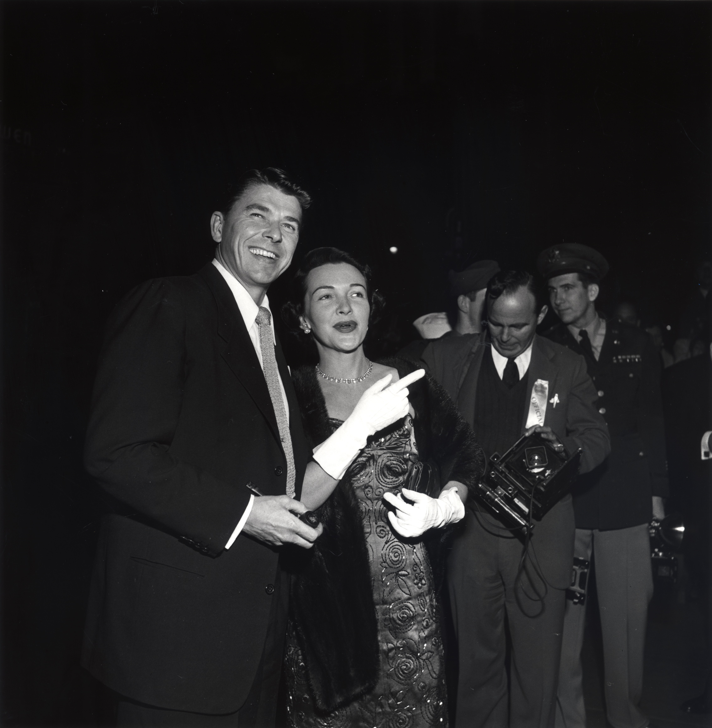 Ronald Reagan (holding a pipe) and Nancy Reagan at the time of their wedding