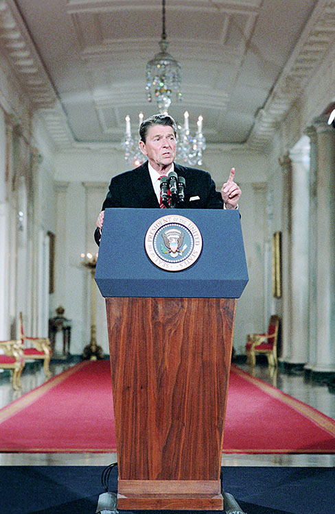 File:President Ronald Reagan speaking at a podium during his final