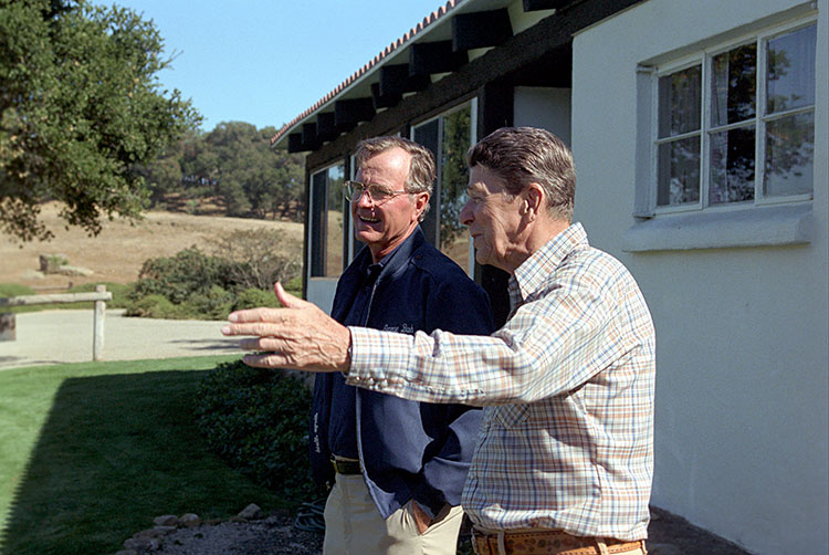 C30531-12, President Reagan talking with Vice President Bush at Rancho Del ...