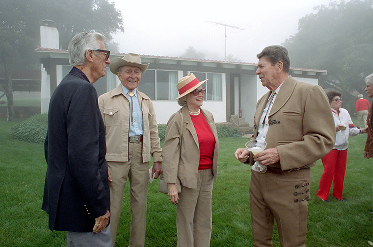 Reagan talking with friends Lew Wasserman, Earle Jorgensen and Edie Wasserm...