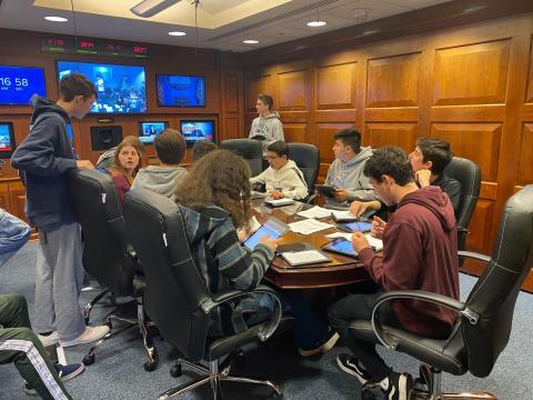 Students participating in the Situation Room Experience