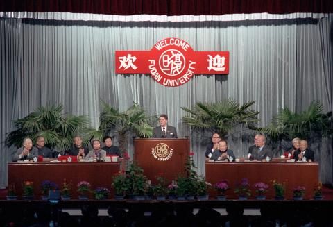 President Reagan at the podium during a speech at Fudan University during a trip to the People's Republic of China in Shanghai