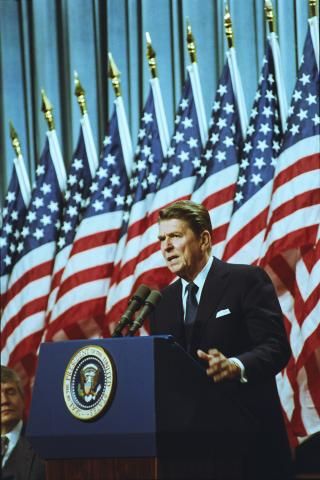 2-8-1982 President Reagan speaking with a flag background a rally for Senator David Durenberger
