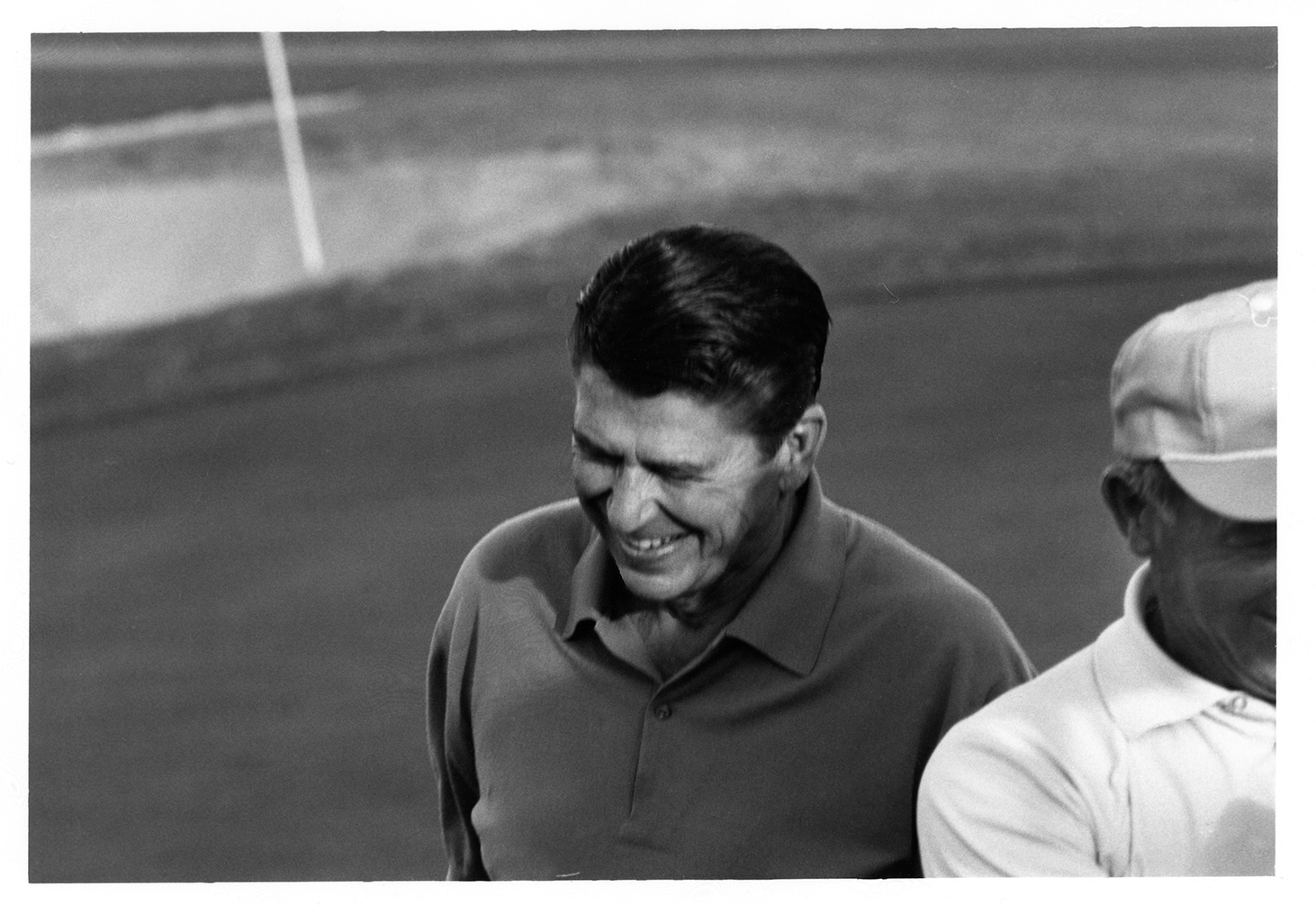 AVC203_3.jpg Smiling golfing