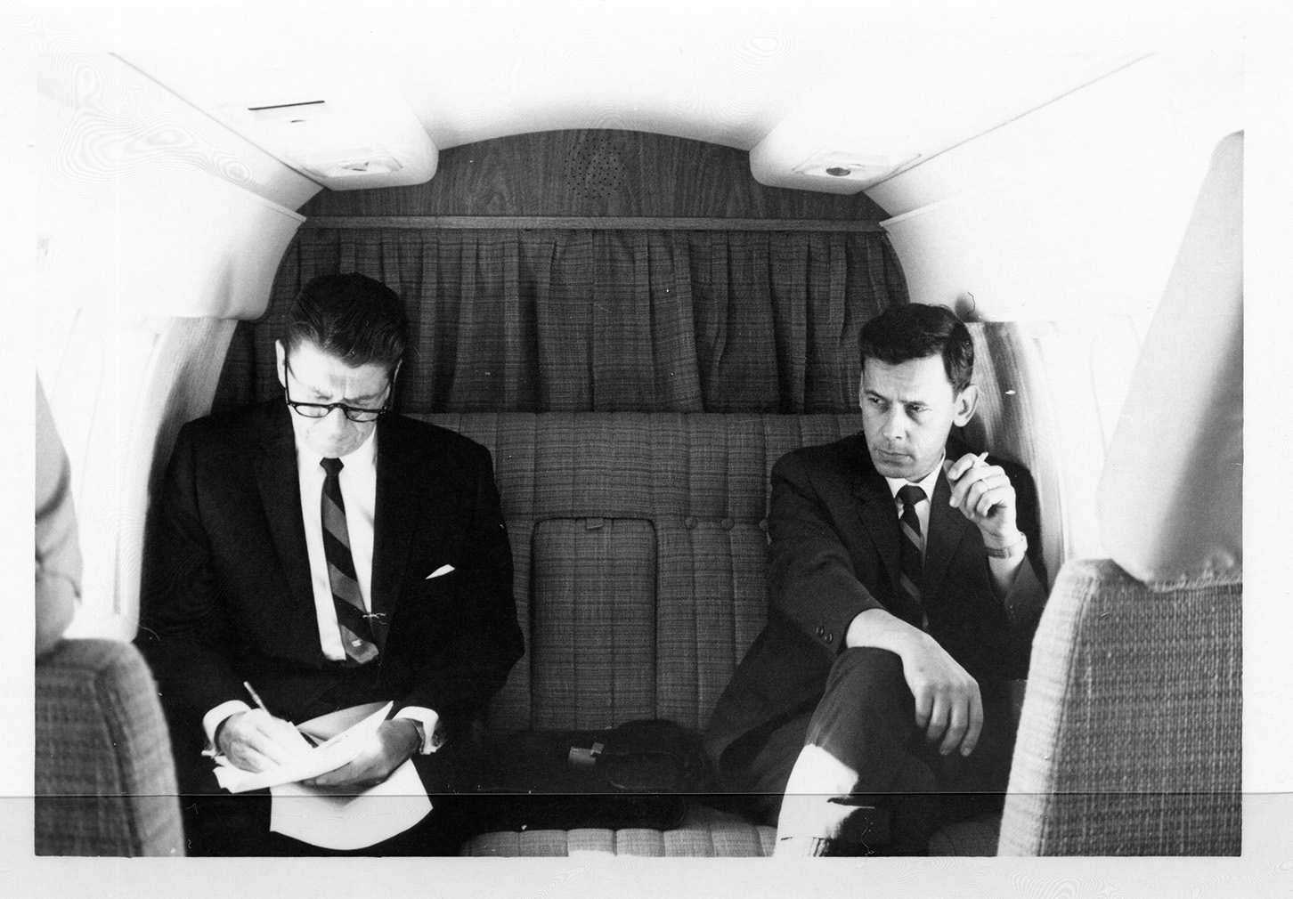AVC243.jpg Governor aboard airplane