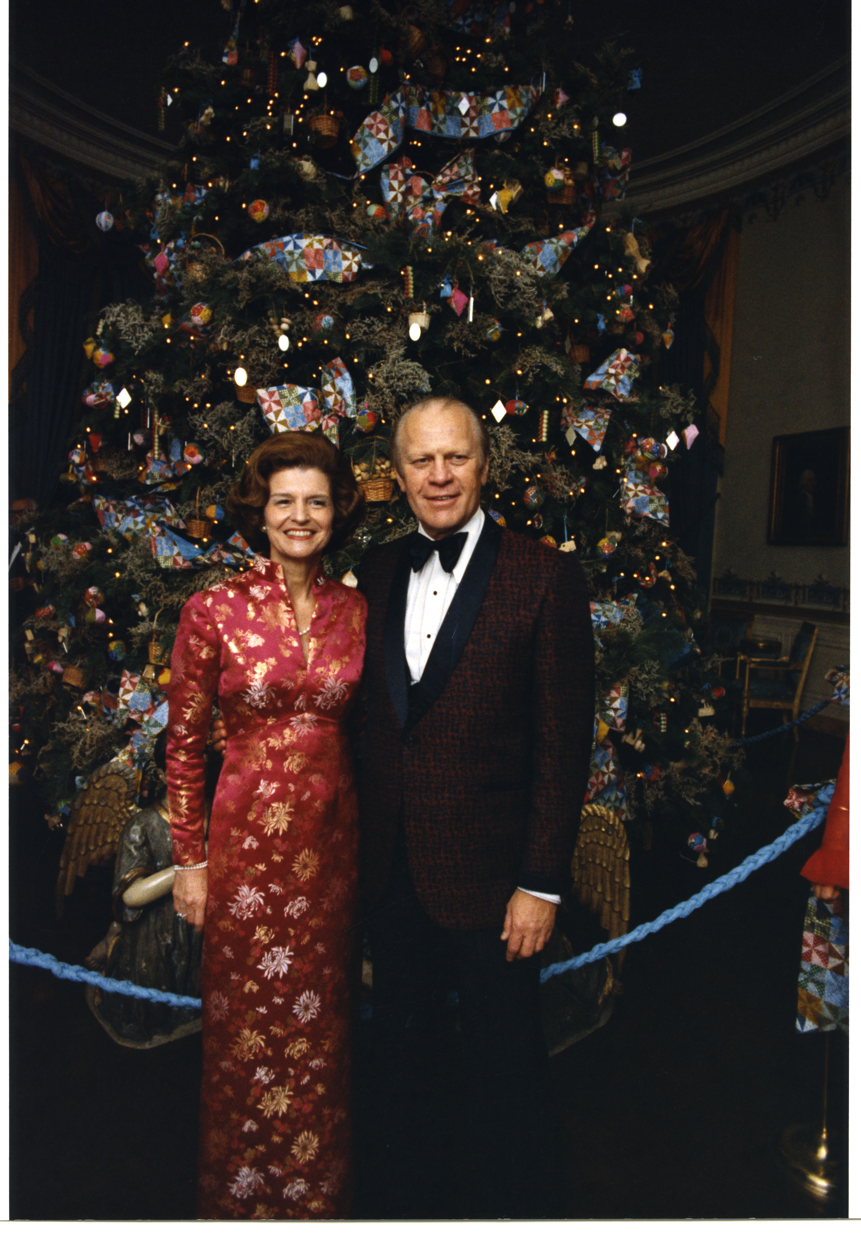 President Ford and Betty Ford by White House Christmas tree in Blue Room