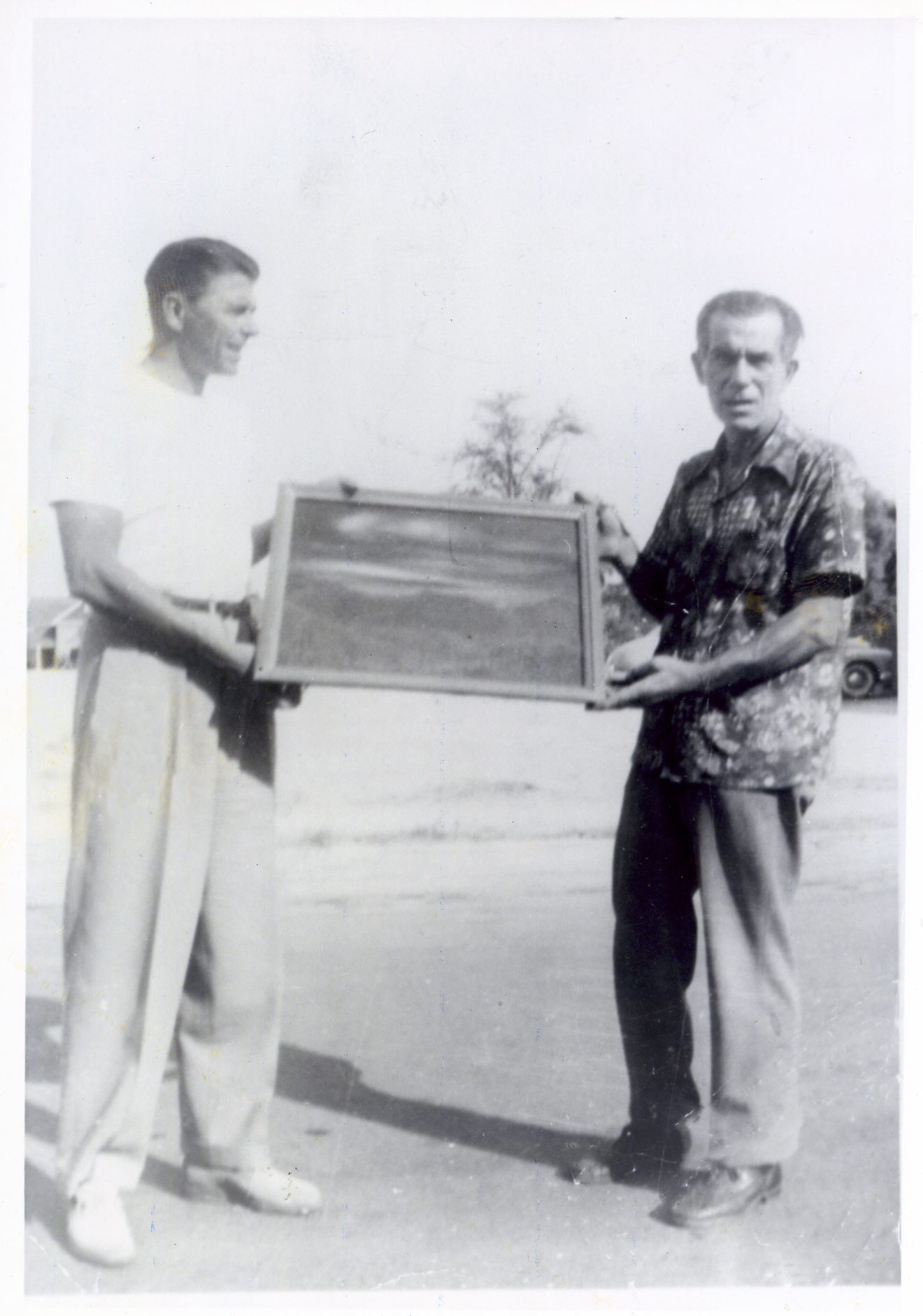 Ronald Reagan and unidentified man