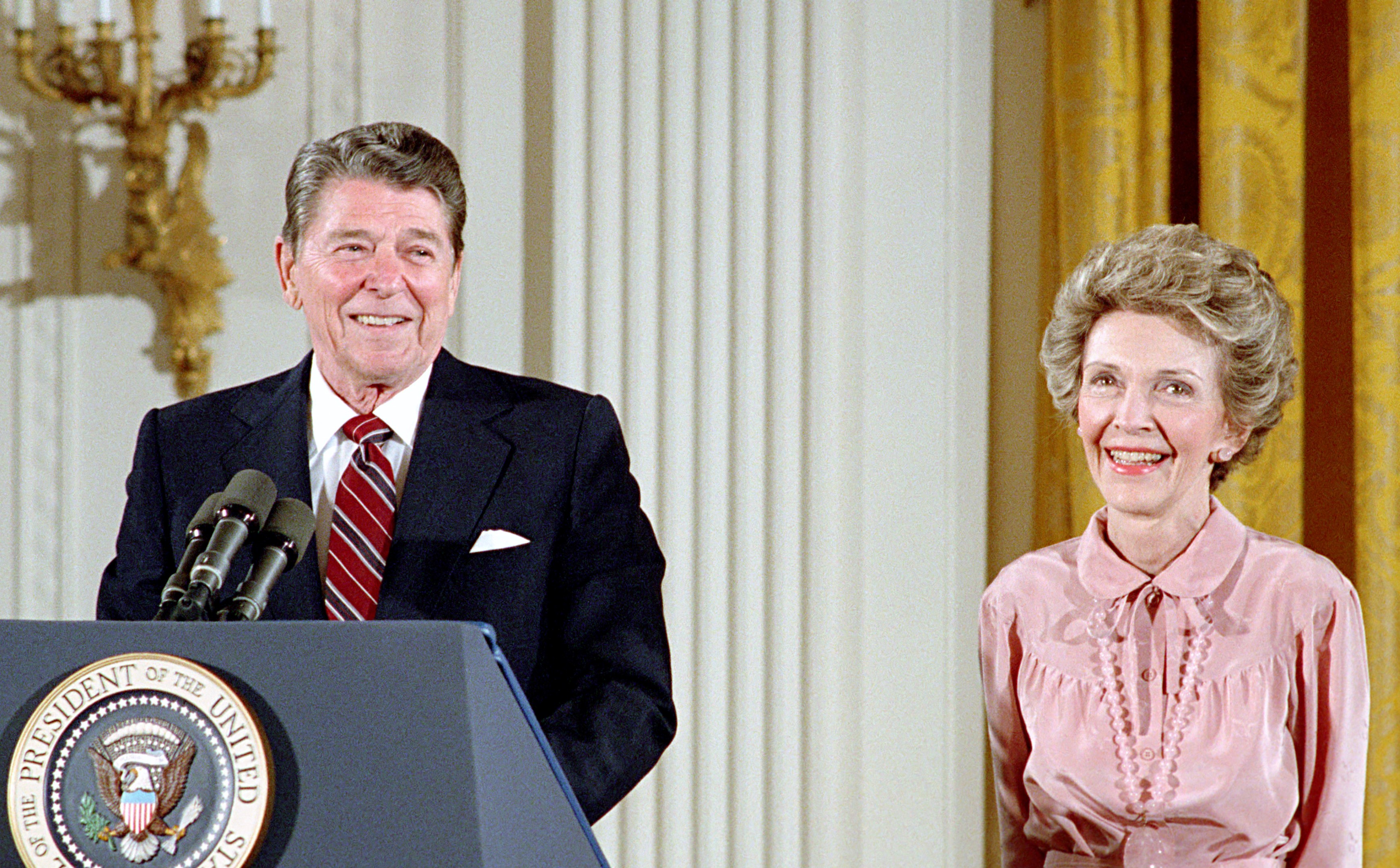 Catalog Number 75854825. President and Mrs. Reagan speaking at Volunteer Action Awards.