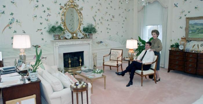 C5178-10, President and Nancy Reagan sitting in their newly remodeled First Family White House bedroom. 11/18/1981.