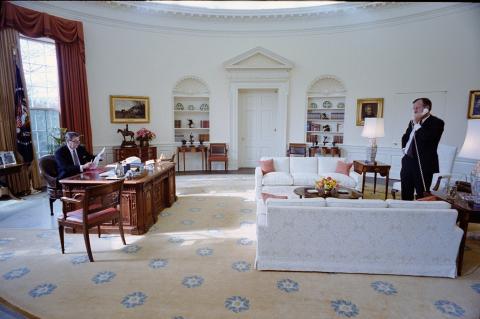 George Bush on telephone