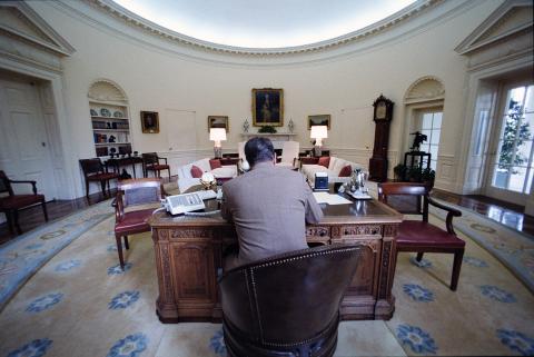 President on the telephone in oval office