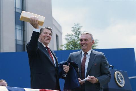 5-30-1985 President Reagan receiving a gift of 5 pound block of Wisconsin cheese