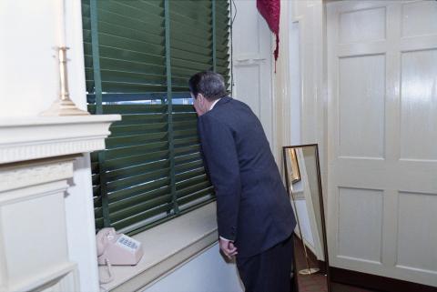 looking out a window
