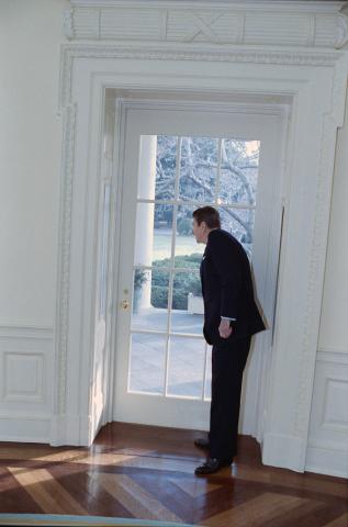 looking out glass door