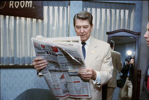 reading the newspaper