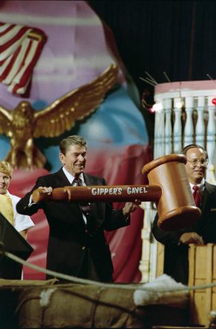 holding large gift hammer