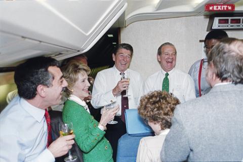 Air Force One with campaign staff