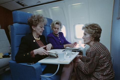 Nancy Reagan talking to staff Air Force One