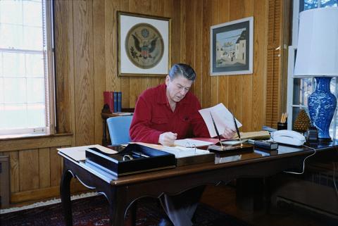 President Reagan working at Camp David
