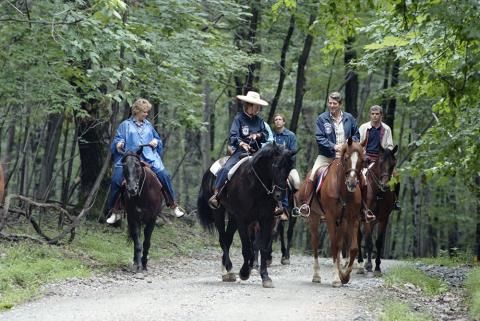 Reagans horseback riding at Camp David