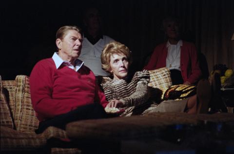 Reagans watching a movie at Camp David