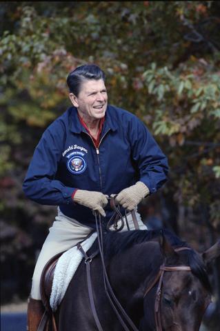 President Reagan horseback riding at Camp David