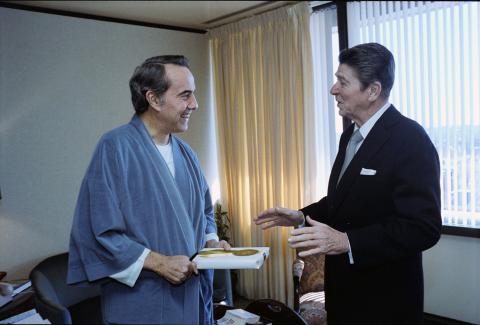 President visiting with Bob Dole