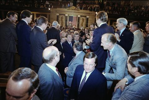 President exiting the US Capitol chamber after speech