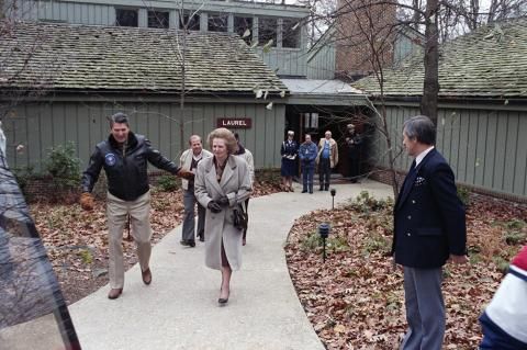 President walking with PM Thatcher