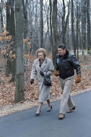 President walking with PM Thatcher