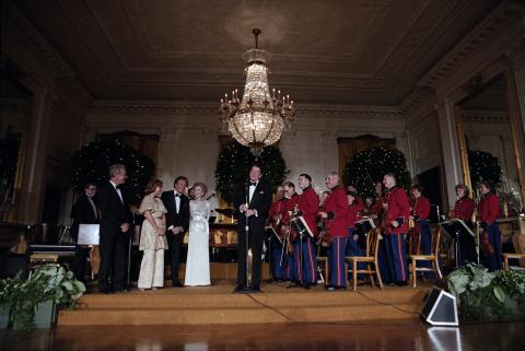 State Visit of Prime Minister Schluter of Denmark, state dinner, entertainment by Vic Damone