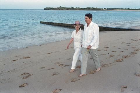 The Reagan's walking along beach in Bali, Indonesia