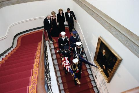 Descending Grand Staircase before State Dinner for Prime Minister Thatcher of the United Kingdom