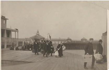 Photograph of Immigrants Landing at Ellis Island Produced: 1900 Public Health Service Historical Photograph File 1880-1943 Record Group 90 Records of the Public Health Service 1794-1990 NAID: 595034