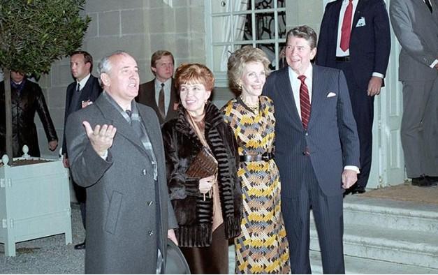 President Ronald Reagan, Nancy Reagan, Raisa Gorbachev and General Secretary Mikhail Gorbachev at Maison de Saussure for dinner during the Geneva Summit in Switzerland, 11/20/1985 