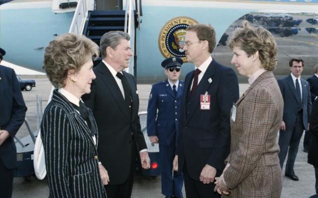 President Ronald Reagan and Nancy Reagan arriving via Air Force 1 in Houston, Texas for the memorial service for the crew of the Space Shuttle Challenger with acting administrator of the National Aeronautics and Space Administration (NASA)William Graham. 01/31/1986. C33145-12.