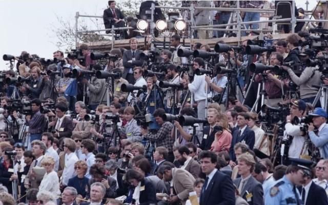 Press at the memorial service for the crew of the Space Shuttle Challenger in Houston, Texas. 01/31/1986. C33152-10.