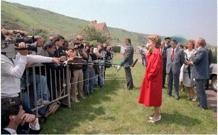 Nancy Facing the Press at Omaha Beach Cemetery for D-Day Memorial Ceremonies