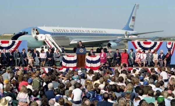 President Ronald Reagan delivering remarks at a Reagan-Bush 1984 airport rally at the Cedar Rapids Municipal Airport in Cedar Rapids, Iowa 09/20/1984 