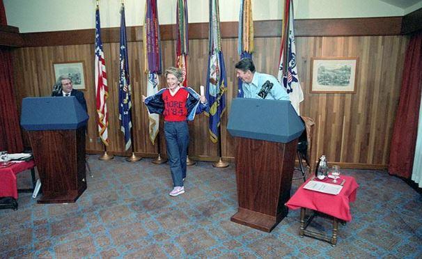 Nancy Reagan showing off her 4 more in ’84 sweater during debate preparation for the upcoming presidential debate on domestic policy between President Ronald Reagan and David Stockman