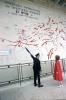 Nancy Reagan with group looking at map of Military Operations in Western Europe. Nancy Reagan with group looking at map of Military Operations in Western Europe.