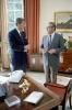 President Ronald Reagan meeting with former Secretary of State Henry Kissinger and former national security officials in the Oval Office 10/05/1981  NAID: 276563297