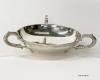 TWest & Son silver dish with Celtic designs. This silver bowl was presented on the occasion of a St. Patrick’s Day luncheon on March 17, 1981 at the residence of the Irish Ambassador to the United States Sean Donlon in Washington, D.C. Gifter: Ambassador Sean Donlon of Ireland and Minister for Finance of Ireland Eugene Fitzgerald. Artifact ID: 1981.01189.01 West & Son silver dish with Celtic designs. This silver bowl was presented on the occasion of a St. Patrick’s Day luncheon on March 17, 1981 at the residence of the Irish Ambassador to the United States Sean Donlon in Washington, D.C. Gifter: Ambassador Sean Donlon of Ireland and Minister for Finance of Ireland Eugene Fitzgerald. Artifact ID: 1981.01189.01