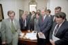 President Ronald Reagan watching the tax bill vote on television with staff in the White House 08/19/1982  NAID: 75856979