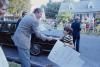 President Ronald Reagan shaking hands with Josh who holds a sign that reads “I want to shake our President’s hand” in Bethesda, Maryland 06/05/1983 NAID: 75852861