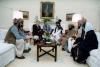 President Ronald Reagan meeting with Afghan Freedom Fighters to discuss Soviet atrocities in Afghanistan in the Oval Office 02/02/1983  NAID: 75852643