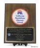 A wooden plaque with a metal disk with text stating, "California Republican Hispanic Council" and "To our special honorary member, your courageous leadership during a difficult time for our country has been an inspiration to Americans everywhere, Mr. president, fellow council member, we did it in '80, we'll do it again in '84, with our best wishes."