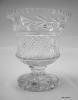 A compote style crystal glass vase by Galway Irish Crystal. Prime Minister Garret FitzGerald of Ireland traveled to Washington, D.C. for an official working visit March 14-16, 1984. During the White House luncheon on March 16, he presented this vase with the traditional shamrocks to President Ronald Reagan. Artifact ID: 1984.01240.01 A compote style crystal glass vase by Galway Irish Crystal. Prime Minister Garret FitzGerald of Ireland traveled to Washington, D.C. for an official working visit March 14-16, 1984. During the White House luncheon on March 16, he presented this vase with the traditional shamrocks to President Ronald Reagan. Artifact ID: 1984.01240.01