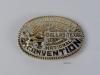 Sterling silver oval belt buckle with the text "REPUBLICAN NATIONAL CONVENTION, DALLAS, TEXAS 1984." The buckle's image shows an elephant standing on its back legs dressed like a cowboy and waving two American flags. The back of the buckle is stamped "CRUMRINE MFG RENO NV USA 22 K GOLD ON STERLING."