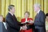 President Ronald Reagan presenting the Presidential Medal of Freedom to actor, and pilot during World War II and rising to colonel in the Eighth Air Force James “Jimmy” Stewart in the East Room 05/23/1985  NAID: 75854125